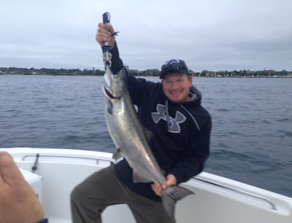 Alex Catches 20 lbs. Salmon Fishing Charters Traverse